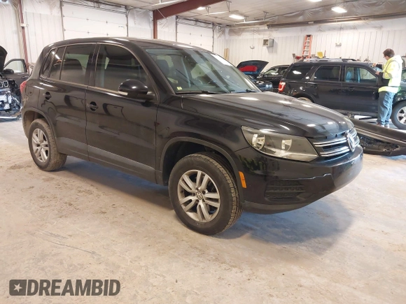 2014 Volkswagen Tiguan SE z VIN WVGAV3AX9EW614094, wystawiony jako IAAI lot #42350601 z przebiegiem 128 996 mil mil oraz . Historia ofert i sprzedaży dostępna na DreamBid. Obrazek 1.