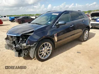 2014 Cadillac SRX Performance Collection with VIN 3GYFNCE39ES560058, listed as a Copart auction lot 61755235 with 67,150 mi miles and Salvage title. Bid and sale history available at DreamBid. Image 1.