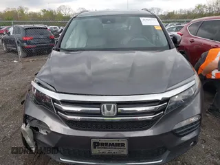 2016 Honda Pilot Touring with VIN 5FNYF6H93GB003106, listed as a IAAI auction lot 41989772 with 110,123 mi miles. Bid and sale history available at carsss.com. Image 12.