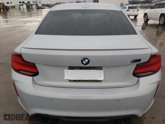 2020 BMW M2 Competition with VIN WBS2U7C01L7D66378, listed as a Copart auction lot 86432704 with 56,973 mi miles and Salvage Title. Bid and sale history available at carsss.com. Image 6.