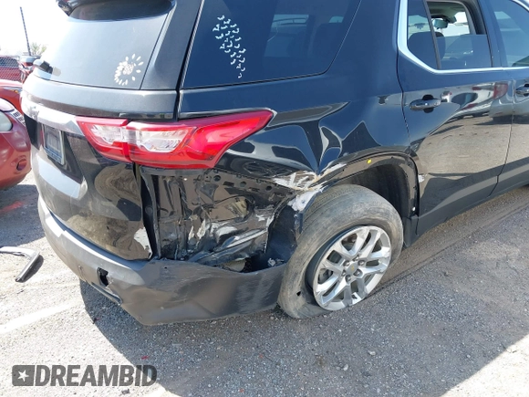 2020 Chevrolet Traverse LS z VIN 1GNERFKW0LJ172972, wystawiony jako IAAI lot #42011302 z przebiegiem 90 799 mil mil oraz . Historia ofert i sprzedaży dostępna na DreamBid. Obrazek 12.