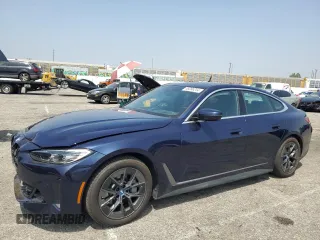 2023 BMW i4 eDrive40 with VIN WBY73AW09PFN76758, listed as a Copart auction lot 48096254 with 9,909 mi miles. Bid and sale history available at carsss.com. Image 1.