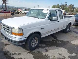 1996 Ford F-150 with VIN 1FTEX15H9TKA56551, listed as a IAAI auction lot 41674788 with 314,443 mi miles. Bid and sale history available at carsss.com. Image 2.