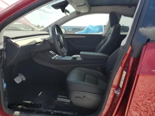 2024 Tesla Model Y Performance with VIN 7SAYGDEF1RF052175, listed as a Copart auction lot 51743895 with 4,869 mi miles and Salvage Title. Bid and sale history available at DreamBid. Image 7.