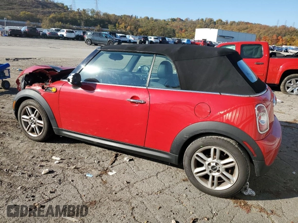 2013 MINI Convertible with VIN WMWZN3C58DT265980, listed as a Copart auction lot 77157154 with 88,975 mi miles and Salvage title. Bid and sale history available at DreamBid. Image 2.