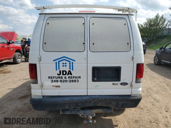 2013 Ford Econoline Cargo Commercial with VIN 1FTNE2EW6DDA33129, listed as a Copart auction lot 57098145 with 125,302 mi miles and Clean title. Bid and sale history available at DreamBid. Image 6.