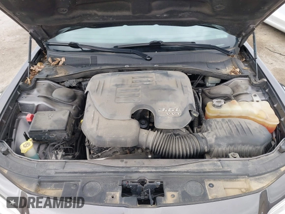 2013 Chrysler 300 with VIN 2C3CCAAG9DH707447, listed as a IAAI auction lot 42292077 with 171,329 mi miles and . Bid and sale history available at DreamBid. Image 10.