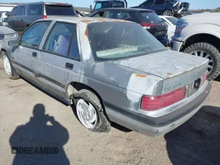 1992 Chevrolet Corsica LT z VIN 1G1LT53T9NY154246, wystawiony jako IAAI lot #41834072 z przebiegiem 87 587 mil mil oraz . Historia ofert i sprzedaży dostępna na DreamBid. Obrazek 3.