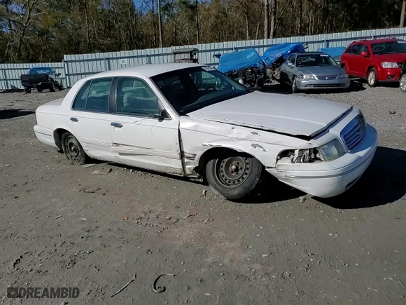 2000 Ford Crown Victoria LX with VIN 2FAFP74W0YX125595, listed as a Copart auction lot 84675434 with 151,438 mi miles and Salvage Title. Bid and sale history available at carsss.com. Image 11.