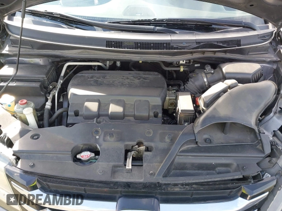 2014 Honda Odyssey EX-L with VIN 5FNRL5H64EB055807, listed as a IAAI auction lot 41760758 with 144,346 mi miles and . Bid and sale history available at carsss.com. Image 10.