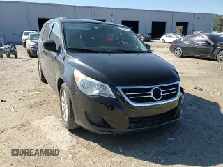 2014 Volkswagen Routan SE with VIN 2C4RVABG9ER135273, listed as a Copart auction lot 45343575 with 94,528 mi miles and Salvage title. Bid and sale history available at DreamBid. Image 12.