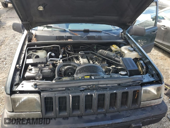 1993 Jeep Grand Cherokee Laredo with VIN 1J4GZ58S4PC580315, listed as a Copart auction lot 85105304 with 202,460 mi miles and Clean Title. Bid and sale history available at carsss.com. Image 12.
