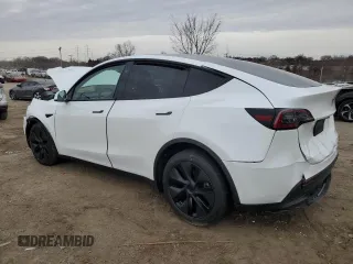 2025 Tesla Model Y Long Range with VIN 7SAYGDED1SF248427, listed as a Copart auction lot 43988825 with 1,891 mi miles and Salvage Title. Bid and sale history available at DreamBid. Image 2.