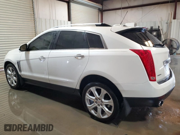 2015 Cadillac SRX Performance Collection with VIN 3GYFNCE36FS531134, listed as a Copart auction lot 54862205 with 103,051 mi miles and Clean title. Bid and sale history available at DreamBid. Image 2.