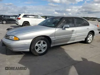 1997 Pontiac Bonneville SE z VIN 1G2HX52K7VH273637, wystawiony jako Copart lot #71179614 z przebiegiem 225 346 mil mil oraz Czysty tytuł • Clean title. Historia ofert i sprzedaży dostępna na DreamBid. Obrazek 1.