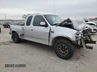 2000 Ford F-150 XL with VIN 1FTRX07L2YKA09673, listed as a Copart auction lot 48177615 with Not provided miles and Salvage title. Bid and sale history available at DreamBid. Image 4.