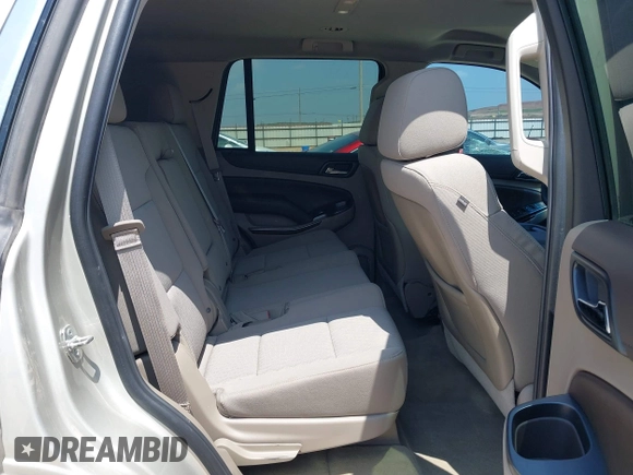 2015 Chevrolet Tahoe LS with VIN 1GNSCAKC9FR294832, listed as a IAAI auction lot 39274877 with 126,932 mi miles and . Bid and sale history available at DreamBid. Image 8.