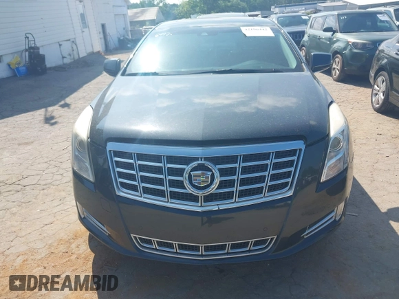 2013 Cadillac XTS Luxury z VIN 2G61P5S37D9110658, wystawiony jako IAAI lot #42196442 z przebiegiem 182 228 mil mil oraz . Historia ofert i sprzedaży dostępna na DreamBid. Obrazek 13.
