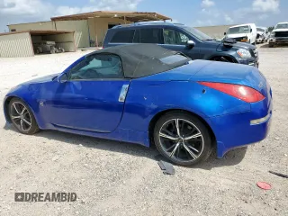 2006 Nissan 350Z Touring z VIN JN1AZ36A36M450869, wystawiony jako Copart lot #59898195 z przebiegiem 160 031 mil mil oraz Czysty tytuł • Clean title. Historia ofert i sprzedaży dostępna na DreamBid. Obrazek 2.