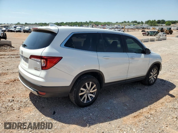 2021 Honda Pilot EX-L with VIN 5FNYF6H52MB096077, listed as a Copart auction lot 56970435 with 59,749 mi miles and Salvage title. Bid and sale history available at DreamBid. Image 3.