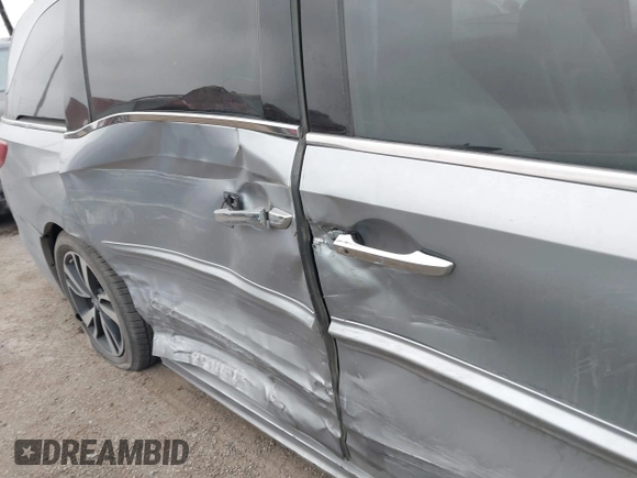 2019 Honda Odyssey Elite with VIN 5FNRL6H94KB109442, listed as a IAAI auction lot 41613350 with 75,986 mi miles and . Bid and sale history available at DreamBid. Image 6.