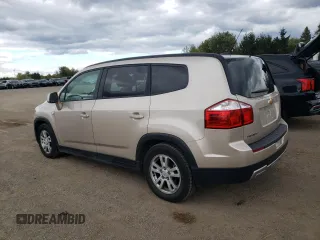2012 Chevrolet Orlando 1LT z VIN KL77P2EMXCK561796, wystawiony jako Copart lot #75188244 z przebiegiem 131 868 mil mil oraz Tytuł czysty. Historia ofert i sprzedaży dostępna na DreamBid. Obrazek 2.