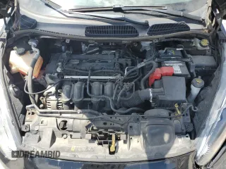 2018 Ford Fiesta SE z VIN 3FADP4BJ9JM123715, wystawiony jako Copart lot #58164015 z przebiegiem 83 768 mil mil oraz Szkoda całkowita • Salvage title. Historia ofert i sprzedaży dostępna na DreamBid. Obrazek 11.