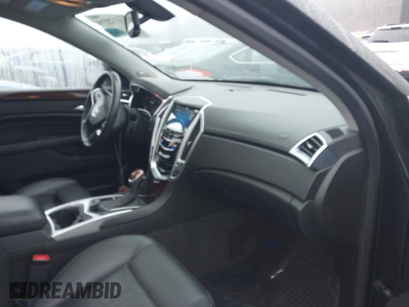 2014 Cadillac SRX Luxury Collection z VIN 3GYFNEE32ES643679, wystawiony jako IAAI lot #42172274 z przebiegiem 122 276 mil mil oraz . Historia ofert i sprzedaży dostępna na DreamBid. Obrazek 5.