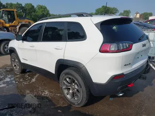 2021 Jeep Cherokee Trailhawk with VIN 1C4PJMBX4MD124980, listed as a IAAI auction lot 42372537 with 55,667 mi miles and . Bid and sale history available at DreamBid. Image 3.