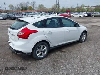 2014 Ford Focus SE with VIN 1FADP3K28EL291260, listed as a IAAI auction lot 42029753 with 98,686 mi miles. Bid and sale history available at carsss.com. Image 4.