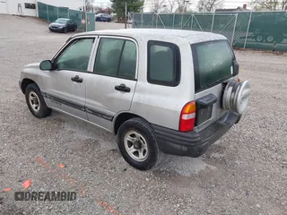 2001 Chevrolet Tracker z VIN 2CNBE13CX16947671, wystawiony jako IAAI lot #41894060 z przebiegiem 140 752 mil mil oraz . Historia ofert i sprzedaży dostępna na DreamBid. Obrazek 3.