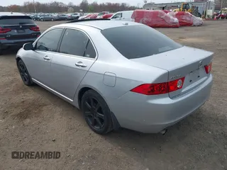 2005 Acura TSX with VIN JH4CL96985C025943, listed as a IAAI auction lot 42043506 with 146,473 mi miles and . Bid and sale history available at DreamBid. Image 3.