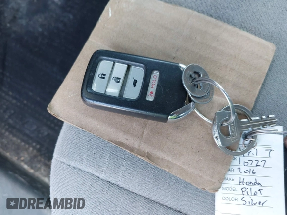 2016 Honda Pilot LX with VIN 5FNYF5H10GB044006, listed as a IAAI auction lot 42075404 with 129,642 mi miles and . Bid and sale history available at DreamBid. Image 11.
