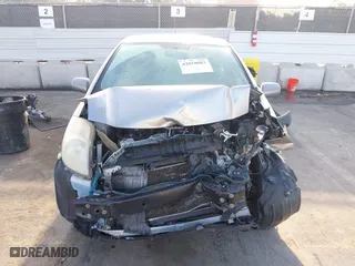 2008 Toyota Yaris with VIN JTDJT923885191561, listed as a IAAI auction lot 42018083 with 228,090 mi miles. Bid and sale history available at carsss.com. Image 6.