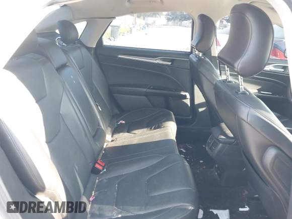 2016 Ford Fusion Titanium Hybrid with VIN 3FA6P0RU2GR357739, listed as a IAAI auction lot 42120441 with 151,201 mi miles. Bid and sale history available at carsss.com. Image 8.