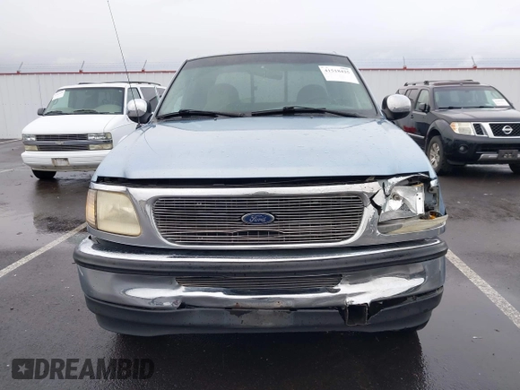 1998 Ford F-150 with VIN 1FTZX1762WKB76211, listed as a IAAI auction lot 41518425 with 265,987 mi miles and . Bid and sale history available at DreamBid. Image 12.