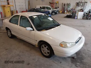 1999 Ford Contour SE z VIN 1FAFP6634XK138025, wystawiony jako IAAI lot #42436185 z przebiegiem 90 226 mil mil oraz . Historia ofert i sprzedaży dostępna na DreamBid. Obrazek 1.