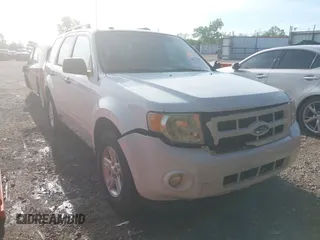 2009 Ford Escape Hybrid z VIN 1FMCU49399KC19803, wystawiony jako IAAI lot #42004776 z przebiegiem 163 353 mil mil oraz . Historia ofert i sprzedaży dostępna na DreamBid. Obrazek 1.