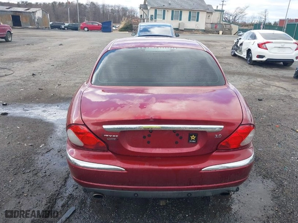 2005 Jaguar X-Type 3.0L with VIN SAJWA51A05WE55760, listed as a IAAI auction lot 41732516 with NaN miles. Bid and sale history available at carsss.com. Image 17.