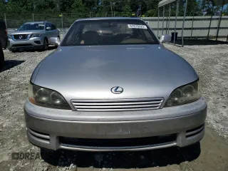 1996 Lexus ES 300 z VIN JT8BF12G6T0185858, wystawiony jako Copart lot #57978925 z przebiegiem 153 841 mil mil oraz Czysty tytuł • Clean title. Historia ofert i sprzedaży dostępna na DreamBid. Obrazek 5.