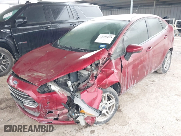 2017 Ford Fiesta SE z VIN 3FADP4BJ9HM159284, wystawiony jako IAAI lot #41291003 z przebiegiem 79 668 mil mil oraz . Historia ofert i sprzedaży dostępna na DreamBid. Obrazek 18.