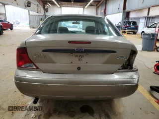 2003 Ford Focus LX with VIN 1FAFP33P63W257719, listed as a Copart auction lot 83937554 with 75,967 mi miles and Salvage Title. Bid and sale history available at carsss.com. Image 6.