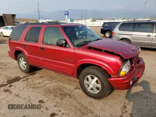 2000 Oldsmobile Bravada z VIN 1GHDT13W6Y2308007, wystawiony jako Copart lot #63862394 z przebiegiem 142 617 mil mil oraz Szkody całkowita. Historia ofert i sprzedaży dostępna na DreamBid. Obrazek 4.