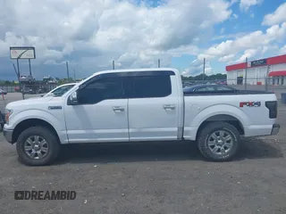 2018 Ford F-150 XL with VIN 1FTEW1E50JKC91068, listed as a IAAI auction lot 42221345 with 135,095 mi miles and . Bid and sale history available at DreamBid. Image 14.