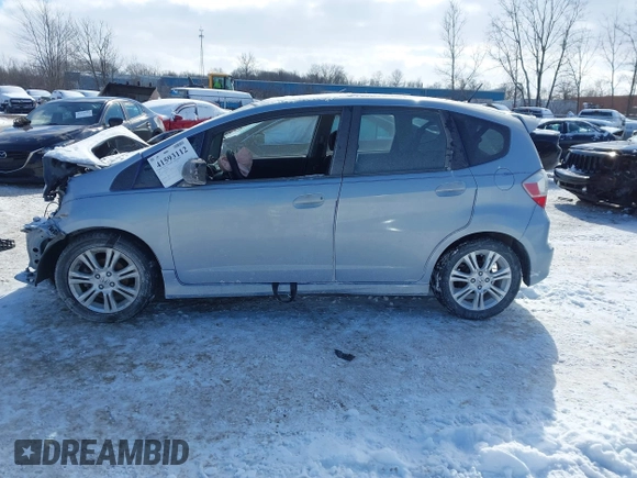 2009 Honda Fit Sport with VIN JHMGE884X9S026613, listed as a IAAI auction lot 41593112 with 144,736 mi miles. Bid and sale history available at carsss.com. Image 14.