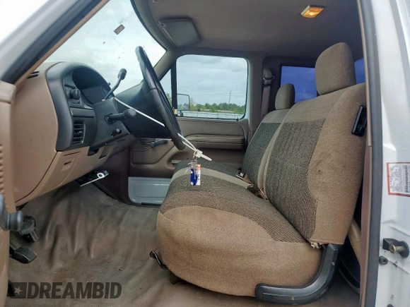 1994 Ford F-250 with VIN 1FTHX25H5RKB57176, listed as a Copart auction lot 63432875 with 188,923 mi miles and Salvage title. Bid and sale history available at DreamBid. Image 7.