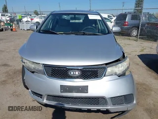 2010 Kia Forte EX with VIN KNAFU4A2XA5097831, listed as a IAAI auction lot 41872156 with 168,081 mi miles. Bid and sale history available at carsss.com. Image 12.