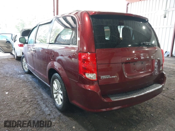 2018 Dodge Grand Caravan SXT with VIN 2C4RDGCG4JR297603, listed as a IAAI auction lot 42144645 with 114,098 mi miles and . Bid and sale history available at DreamBid. Image 3.