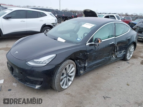 2018 Tesla Model 3 Long Range Battery with VIN 5YJ3E1EB9JF188437, listed as a IAAI auction lot 41371254 with 55,934 mi miles and . Bid and sale history available at DreamBid. Image 17.