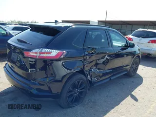 2023 Ford Edge SE z VIN 2FMPK4G90PBA05532, wystawiony jako IAAI lot #41845991 z przebiegiem 39 568 mil mil oraz . Historia ofert i sprzedaży dostępna na DreamBid. Obrazek 4.